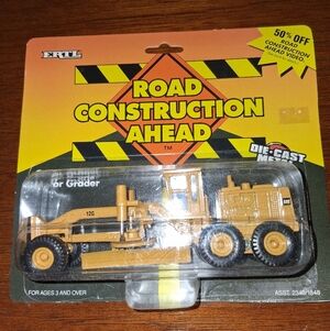 Vintage Ertl Road Construction Ahead Die Cast Caterpillar 12G Motor Grader, NWT